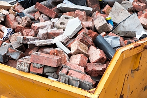 Bricks in dumpster after Baltimore, MD home renovation