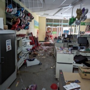 Inside of Dollar Tree with junk on the floor